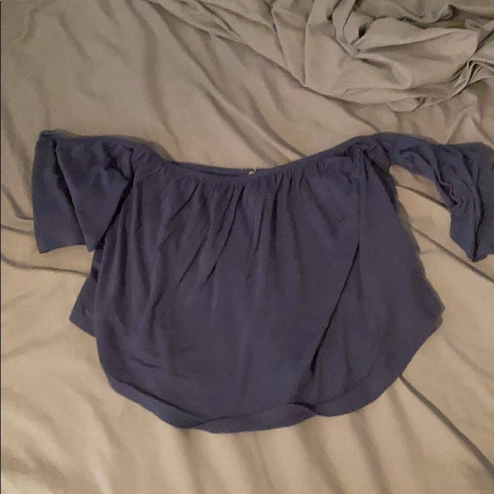 a blue crop top blouse